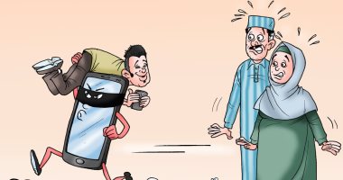 التكنولوجيا تختطف الأبناء فى كاريكاتير ساخر لـ"اليوم السابع"