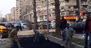 صور.. تواصل أعمال الرصف وتطوير شارع المطبعة لإنشاء مترو الهرم