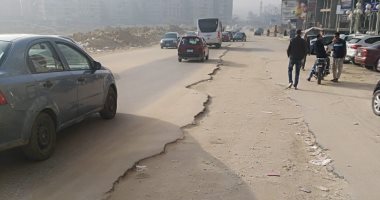 قارئ يشكو تهالك الطريق بمنطقة المعراج السفلى خلف كارفور المعادى