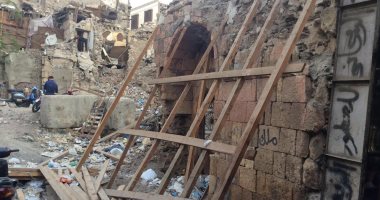 ننشر القصة الكاملة لعقار 88 المثير للجدل الواقع فى شارع المعز