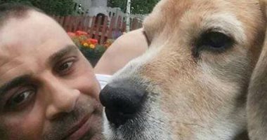 أنا وأليفى.. آدم يشارك: "عندى 5 كلاب وقطتين هما كل حياتى".. صور