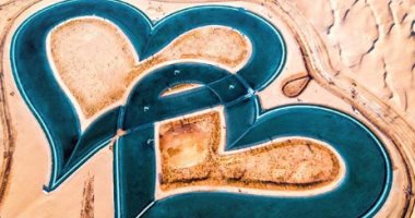فى بحيرات الحب.. إقامة حفل زفاف جماعى لـ18 عريس وعروسة صينيين