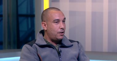 شاهد.. رحالة مصرى يطوف العالم بـ" موتوسيكل وشعار النادى الأهلى"