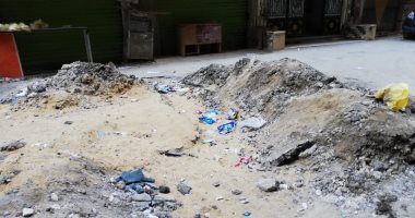مخلفات تصليح ماسورة مياه تغلق شارع جانبى بفيصل