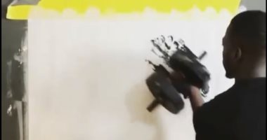 "الرسم بالدمبل" فنان يرسم the rock ودوين جونسون يعلق: أدهشنى.. صور وفيديو