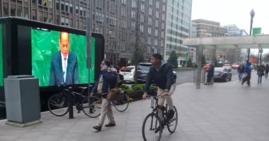 صور الرئيس تجوب شوارع واشنطن ..والجالية المصرية فى انتظار زيارته
