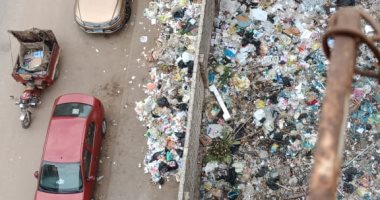 شكوى من تراكم القمامة بشارع الترعة بالمنصورة