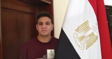 صور.. أول شاب مصرى يصوت بالتعديلات الدستورية فى بكين: "القوة بالشباب"
