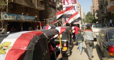 صور.. مسيرة بالسيارات فى عين شمس للحث على المشاركة بالاستفتاء