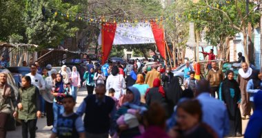 ناخبات الوراق وبشتيل يصطحبن أطفالهن فى التصويت 