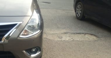 صور.. شكوى من تهالك الأسفلت بشارع عبد المنعم بالمهندسين