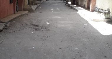 أهالى شارع عبد الستار بالعمرانية يطالبون برصف الشارع بالبلاط الحجرى