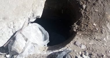 بلاعة صرف صحى بدون غطاء بطريق البراجيل بجوار الدائرى