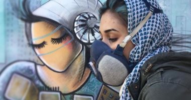 بتحارب بفرشاتها.. أول امرأة ترسم جرافيتى فى شوارع أفغانستان.. صور
