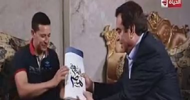 جورج قرداحى يسلم جائزة "اسم من مصر" لفائز من الطالبية