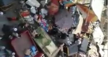 قارئ يشكو من انتشار الباعة الجائلين بشارع التل فى الوراق