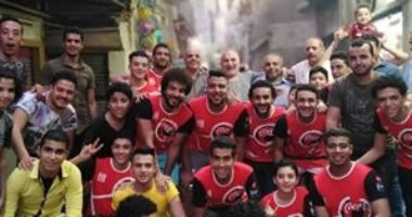 لمة رمضان.. قارئ يشارك بصور لإفطار جماعى بشارع فى المطرية