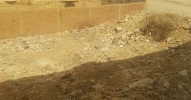 تراكم القمامة والحيوانات النافقة فى شارع الخزان بحدائق الأهرام