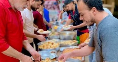 متجمعين على الخير.. أهالى "الثلاثينى فيصل" فى إفطار جماعى لسادس سنة
