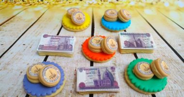 سيبك من الفلوس والفضة .. مى حولت الـ50 و100 جنيه لكب كيك بالشيكولاته