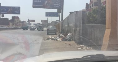 شكوى من انتشار القمامة فوق دائرى كوبرى المنيب بالطريق الدائرى