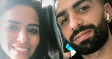 أسامة إبراهيم فى مطار القاهرة استعداداً لرحلة شهر العسل.. صور