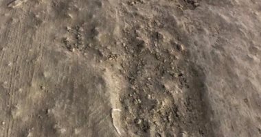 سكان منطقة حدائق الاهرام يطالبون برصف الطريق  