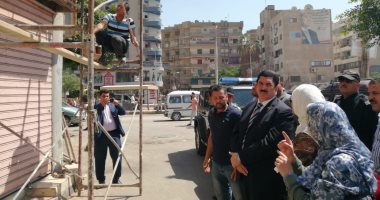 صور.. محافظ القليوبية يتفقد العمارات أثناء طلاء واجهاتها