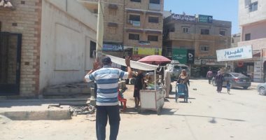 صور .. تنفيذ حملة إزالة اشغالات بمحيط المكتبة العامة فى العريش