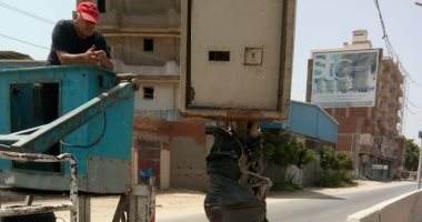 استجابة لـ"اليوم السابع".. تغطية أعمدة الإنارة وكابلات الكهرباء المكشوفة بالمحلة