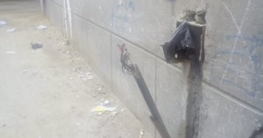 صورة.. كابل كهرباء غير مغطى يهدد حياة المارة بشارع بالخصوص