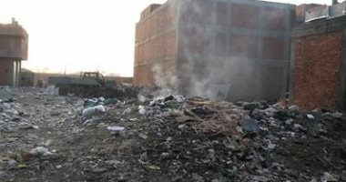 الدخان القاتل..شكوى من تراكم القمامة واحتراقها فى شارع ممدوح بيومى بالقليوبية