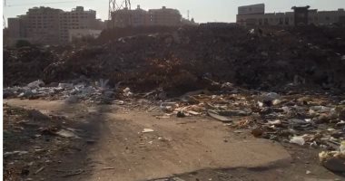 شكوى من تراكم القمامة فى شارع أبو بكر الصديق بالمعادى