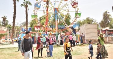 صور.. حدائق أسيوط تستقبل المواطنين ورحلات نيلية وعروض فنية فى ثانى أيام العيد