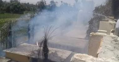 السيطرة على حريق أشجار ومخلفات زراعية بجوار مدرسة بإسنا