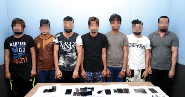شرطة أبوظبى تضبط 3 عصابات آسيوية متخصصة فى النصب عن طريق الهواتف