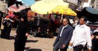 "تشوية وتكدس مرورى".. شكوى من انتشار الباعة فى ميدان القلعة بمنفلوط