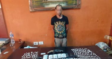 ضبط عاطل بنصف كيلو هيروين وسلاح نارى فى إمبابة