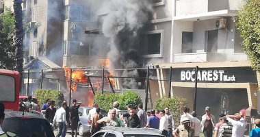 صور .. حريق فى فندق بالدقى والحماية المدنية تحاول السيطرة عليه