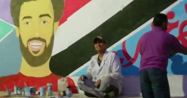 قصة شاب يبدع فى رسم "الجرافيتى" لتطوير مدينة زفتى بالغربية (صور)
