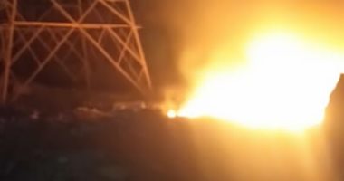 السيطرة على حريق بقطعة أرض أسفل الطريق الدائرى بشبرا الخيمة ..صور