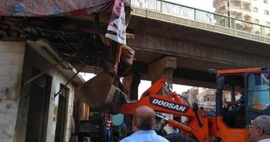 صور.. إزالة محلات كوبرى أبوعميرة بالزقازيق ونقلهم لسوق الجديد 