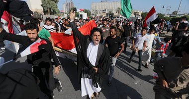 قوات الأمن العراقية تطلق النار بالهواء لتفريق محتجين فى بغداد