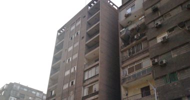 الأجهزة الأمنية تستعد لهدم عقار الدقي المائل بكردون حول العقار