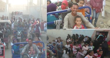 الوحدة الوطنية.. وجيه رفائيل يصطحب أسرته للاحتفال بالمولد النبوى فى أسوان.. الشاب القبطى: "باشترى عروسة المولد لبنتى وجيرانى بيهادونى بعلب الحلوى".. ويؤكد: "بحب أزور الصالحين وبنذر سنويا للشيخ الشاذلى".. صور