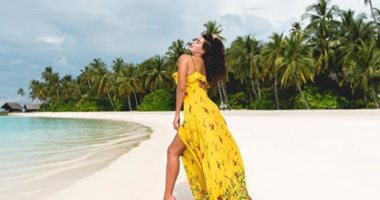  ياسمين صبرى تتدلل فى جزر المالديف بالأصفر.. صور