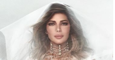 أصالة بفستان أبيض وطرحة: " نهاركم سعيد"