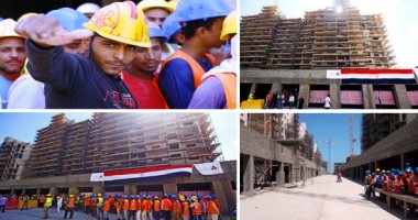 صور.. الطريق إلى العلمين الجديدة.. أعلام مصر تزين الإنشاءات وواجهات المبانى.. خلية نحل من العمال فى سباق مع الزمن لإنهاء المشروع.. والعاملين فى المشروع: "خير لبلدنا وأولادنا"