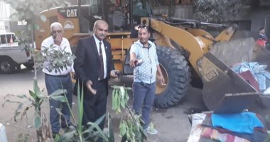 حملات لرفع الاشغالات بالدقى ومكافحة الكلاب الضالة بهضبة الأهرام 