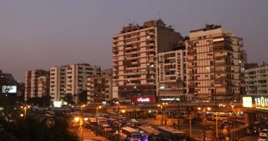  صور..  محافظة الجيزة تنهى طلاء عقارات الميدان بلون موحد 